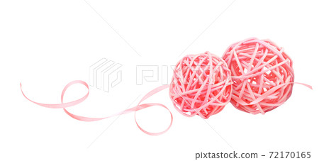 Dry pink rattan balls and twisted satin ribbon isolated on white Dry pink rattan balls and twisted satin ribbon isolated on white 72170165