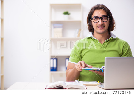 Young male student in the classroom 72170186