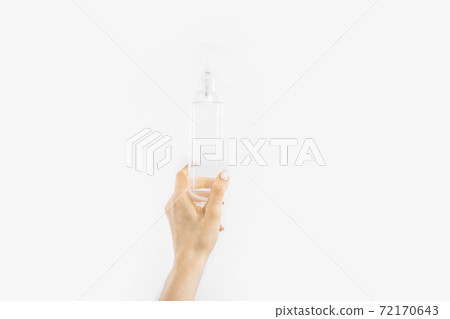 Bottle with antibacterial antiseptic gel in hand on white background 72170643