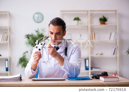 Young male student doctor in education concept Young male student doctor in education concept 72170918