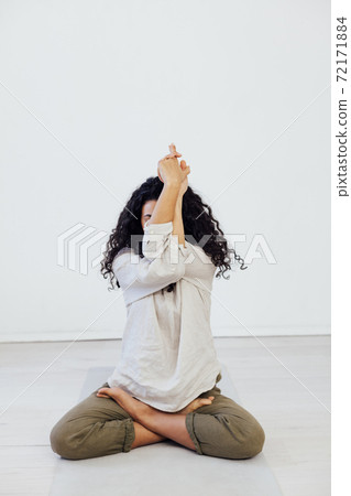 Beautiful woman yoga asana gymnastics body flexibility 72171884