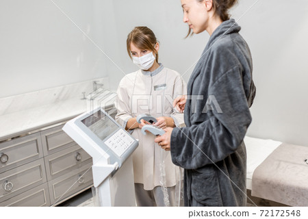Woman with a medic during Inbody test at Spa 72172548