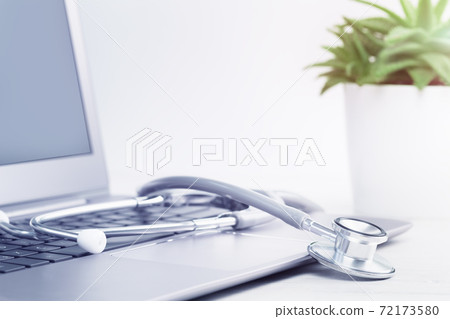 Stethoscope on a laptop. Virus season, pandemic. Smart working 72173580