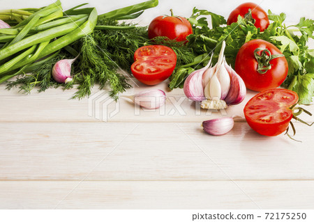 Garlic tomato and herb on the white wooden background 72175250