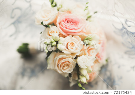 Beautiful wedding bouquet with different flowers, roses 72175424