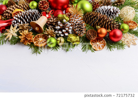 Christmas greeting card with decor, cones and jingle bell Christmas greeting card with decor, cones and jingle bell 72175732