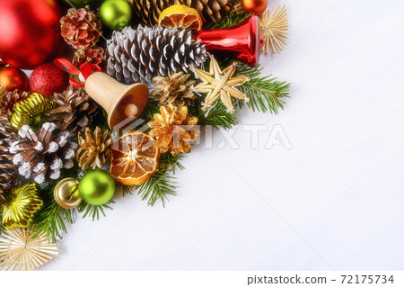Christmas greeting card with wooden jingle bell and fir branches Christmas greeting card with wooden jingle bell and fir branches 72175734