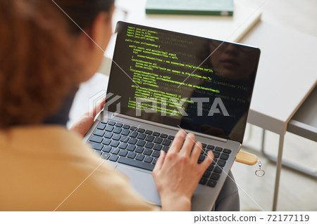 Software programmer at office 72177119