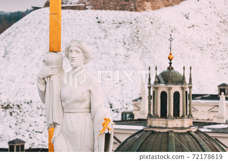 Vilnius Lithuania. Close Pediment Of Cathedral Basilica Of St. Stanislaus, St. Vladislav With Statues Of St. Elena And St. Stanislaus In Winter Day Vilnius Lithuania. Close Pediment Of Cathedral Basilica Of St. Stanislaus, St. Vladislav With Statues Of St. Elena And St. Stanislaus In Winter Day 72178619