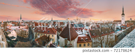 Tallinn, Estonia, Europe. Rooftop View Of Tallinn Skyline Cityscape During Sunrise. Old Town And Modern City At Morning. Popular Place With Famous Landmarks. UNESCO. Panorama. Altered Sunset Sky Tallinn, Estonia, Europe. Rooftop View Of Tallinn Skyline Cityscape During Sunrise. Old Town And Modern City At Morning. Popular Place With Famous Landmarks. UNESCO. Panorama. Altered Sunset Sky 72178624