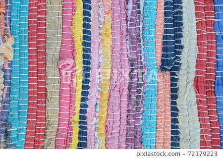 Close-up of rug woven from colored threads Close-up of rug woven from colored threads 72179223