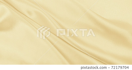 Smooth elegant golden silk or satin luxury cloth texture as wedding background. Luxurious background design. In Sepia toned. Retro style 72179704