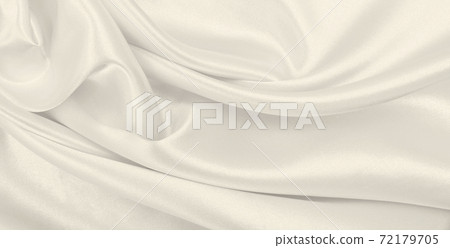 Smooth elegant golden silk or satin luxury cloth texture as wedding background. Luxurious background design. In Sepia toned. Retro style 72179705