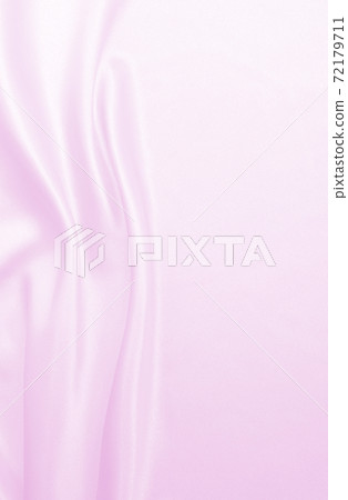 Smooth elegant pink silk or satin texture as wedding background. Luxurious background design Smooth elegant pink silk or satin texture as wedding background. Luxurious background design 72179711