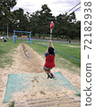 Boy playing with plaything 72182938