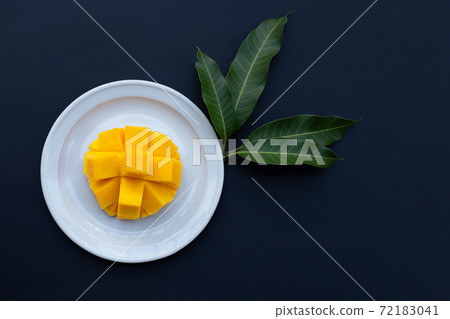 Tropical fruit, Mango on dark background. Tropical fruit, Mango on dark background. 72183041