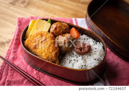 japanese style bento in wooden box with meat ball and croquette japanese style bento in wooden box with meat ball and croquette 72184637