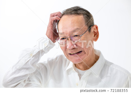 A shy senior man portrait 72188355