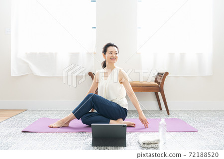 Middle woman stretching at home 72188520