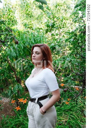 Happy young redhair woman portrait, summer outdoors 72194302