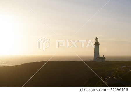 Seaside scenery with a lighthouse 72196156