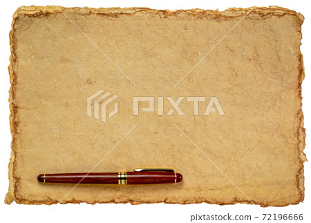 isolated stack of tan toned deckle edge paper sheets 72196666