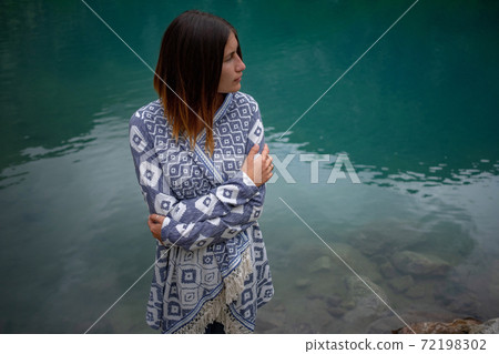 Adventure woman feeling freezing among mountains, enjoy the nature view. 72198302