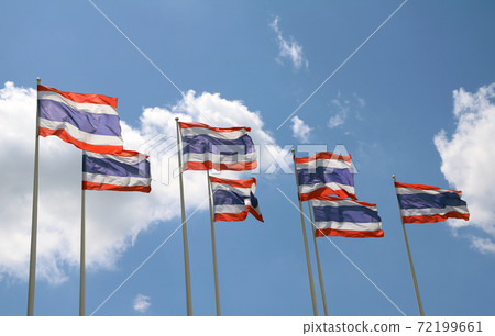 Seven Thai National flag on bright blue sky background. Blown away by wind. Seven Thai National flag on bright blue sky background. Blown away by wind. 72199661