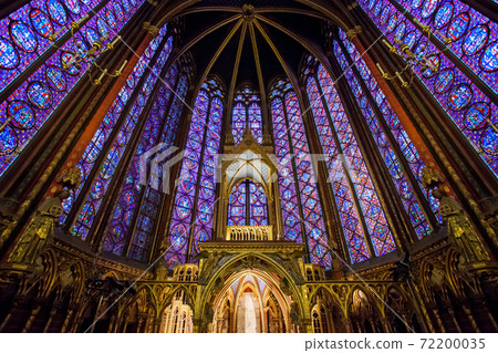 Altar in the upper chapel in Sainte Chapelle. Sainte Chapelle is one of the most beautiful and tourist visited landmark in Paris. 72200035