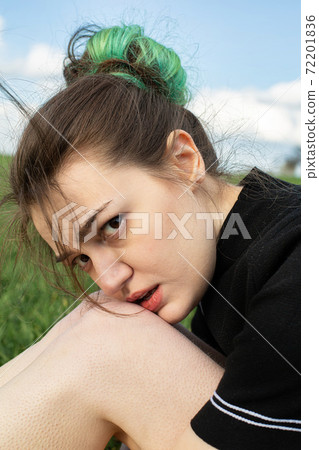 Girl with green hair with sky behind Girl with green hair with sky behind 72201836