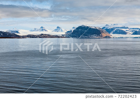 Mountains and glacier in Svalbard islands Mountains and glacier in Svalbard islands 72202423