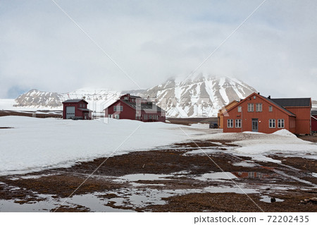 Wooden houses in Ny Alesund, Svalbard islands Wooden houses in Ny Alesund, Svalbard islands 72202435