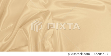 Smooth elegant golden silk or satin luxury cloth texture as wedding background. Luxurious background design. In Sepia toned. Retro style Smooth elegant golden silk or satin luxury cloth texture as wedding background. Luxurious background design. In Sepia toned. Retro style 72204407