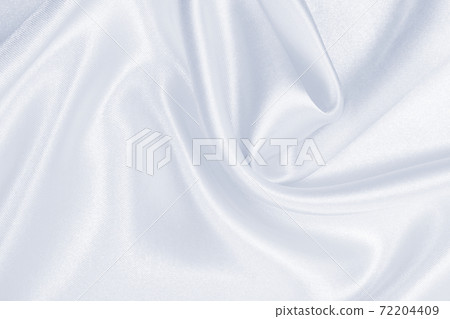 Smooth elegant grey silk or satin luxury cloth as wedding background. Luxurious background design Smooth elegant grey silk or satin luxury cloth as wedding background. Luxurious background design 72204409