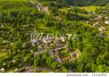 Aerial view of pasture and town of Chamonix in summer 72210958