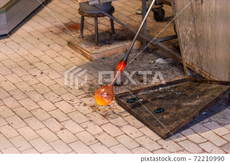 Glass blowing artwork produced under high temperature flame at workshop Glass blowing artwork produced under high temperature flame at workshop 72210990