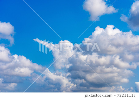 Beautiful blue sky and white clouds for nature backgrounds Beautiful blue sky and white clouds for nature backgrounds 72211115