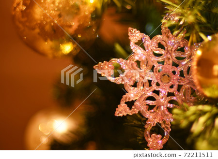 Christmas image Beautiful snowflake ornament on the tree up / close view 72211511
