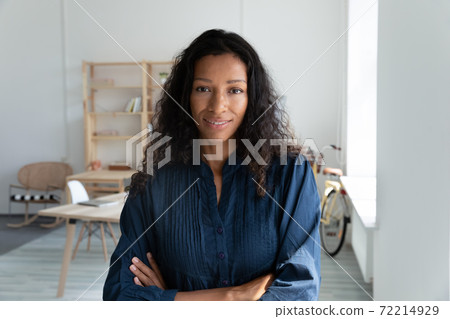 Portrait of African American woman posing in office 72214929