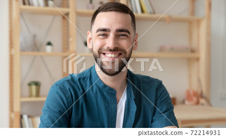 Wide view portrait of smiling man have video call 72214931