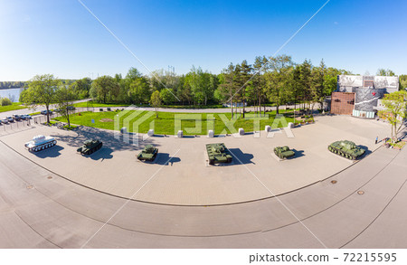 Aerial panoramic View at the Museum diorama in sunny summer day. Monument Soviet tanks. Kirovsk, Leningrad Region, Russia. Translation: "The Museum - panorama the Breakthrough", on tank "Leningrader" 72215595