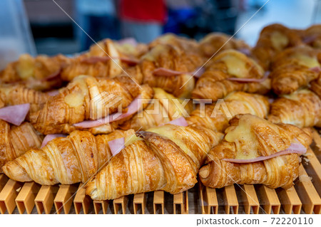 Closeup photo of cheese ham croissant in pastry shop Closeup photo of cheese ham croissant in pastry shop 72220110
