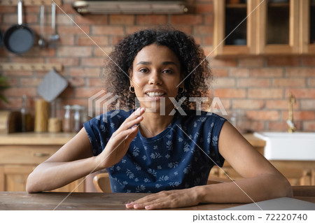 Web camera view focused young african american woman talking. Web camera view focused young african american woman talking. 72220740