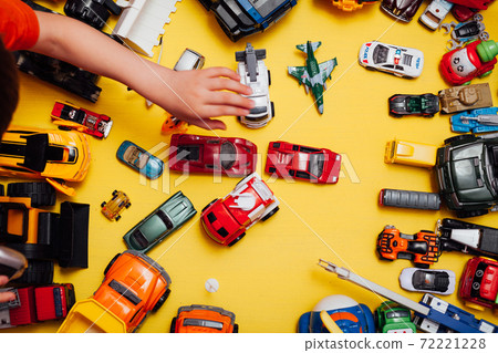 lots of baby car toys for developing games as a backdrop lots of baby car toys for developing games as a backdrop 72221228