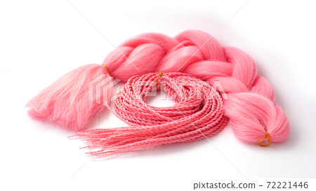 Pink kanekalon hangs on a white background 72221446