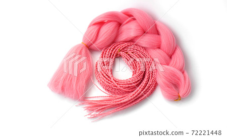 Pink kanekalon hangs on a white background 72221448