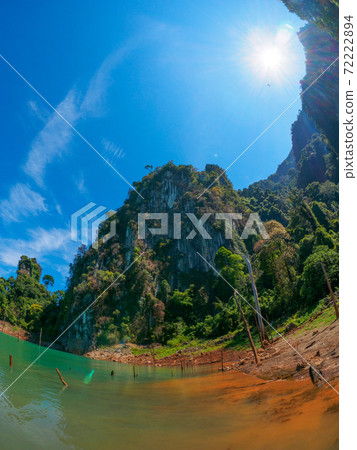 Looking up at a steep cliff (Khao Sok Lake, Surat Thani Province, Kingdom of Thailand) Looking up at a steep cliff (Khao Sok Lake, Surat Thani Province, Kingdom of Thailand) 72222894