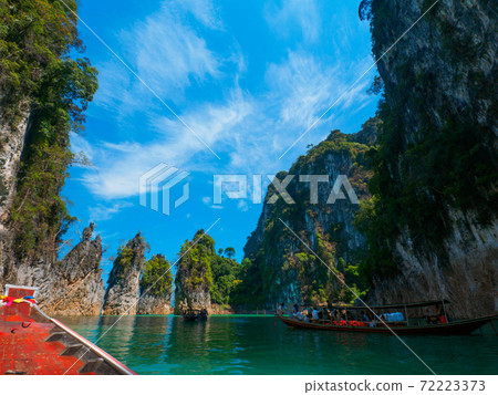 Boat around the islets of the lake (Khao Sok, Surat Thani Province, Kingdom of Thailand) Boat around the islets of the lake (Khao Sok, Surat Thani Province, Kingdom of Thailand) 72223373