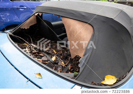 Illegal dumped car blue sports car Illegal dumped car blue sports car 72223886