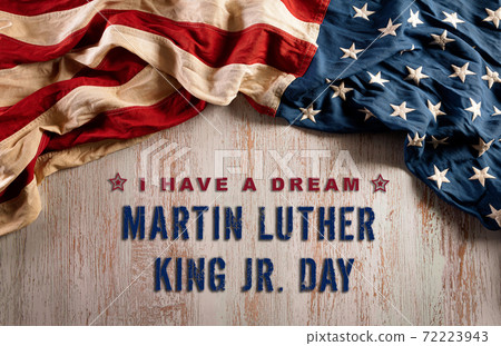 Happy Martin Luther King Day concept. American flag againt old wooden background Happy Martin Luther King Day concept. American flag againt old wooden background 72223943